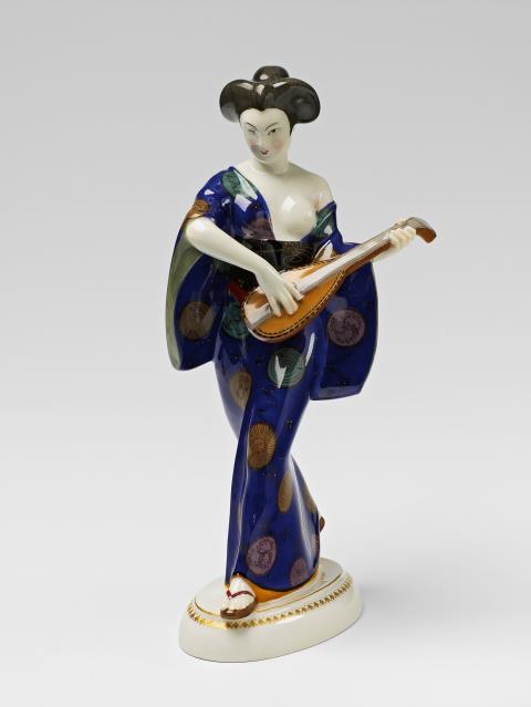 Adolph Amberg - A Berlin KPM porcelain figure of a Japanese lady with a mandolin
from the centrepiece by Adolph Amberg