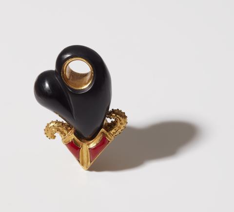 Otto Jakob - A German 18k gold coral and carved ivory heart pendant.