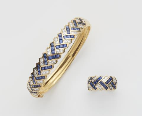 Jeweller Wempe - A German 18k gold sapphire and diamond bangle and ring.
