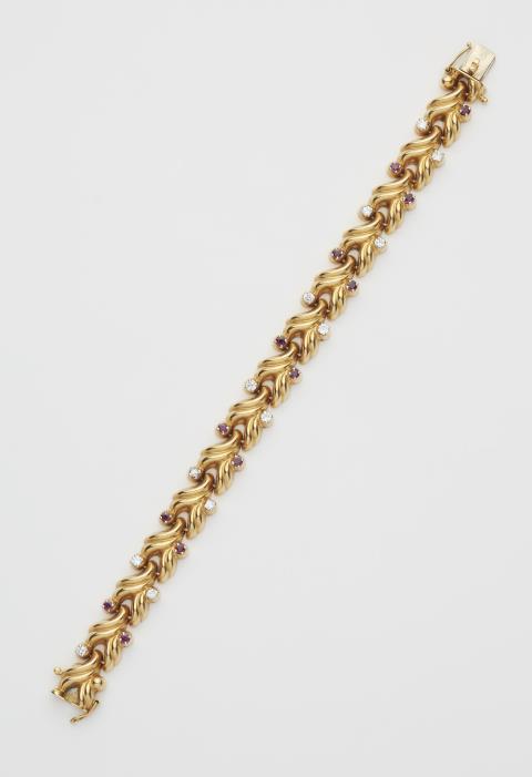 Jeweller Schilling - A German 18k gold repoussé gold diamond and ruby bracelet.