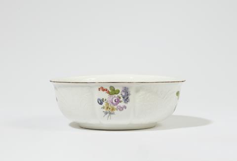 Johann Friedrich Eberlein - A Meissen porcelain dish from a dinner service with naturalistic flowers