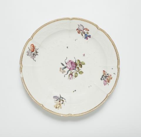 Johann Friedrich Eberlein - A Meissen porcelain dish from a dinner service with woodcut style flowers
