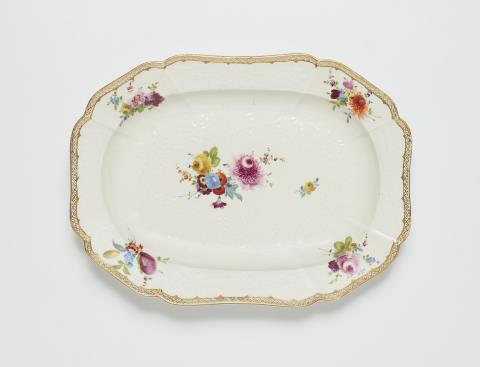 Johann Friedrich Eberlein - A Meissen porcelain platter from a dinner service with floral decor