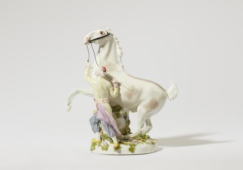  Meissen Royal Porcelain Manufactory - A Meissen porcelain model of a Turkish man taming a rearing horse