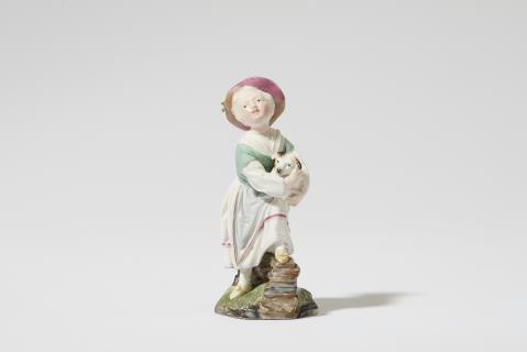 Johann Peter Melchior - A Höchst porcelain figure of a girl with a dog
