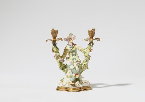  Meissen Royal Porcelain Manufactory - A Meissen porcelain figure of a gardener as a candlestick