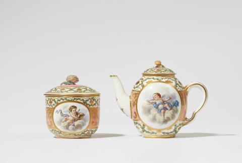  Sèvres - A Sèvres soft porcelain teapot and sugar box with putti