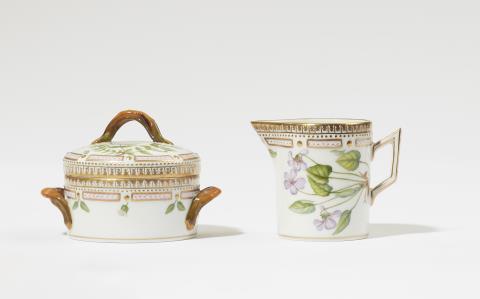  Royal Porcelain Manufacture Copenhagen - A Royal Copenhagen porcelain "Flora Danica" sugar box and milk jug