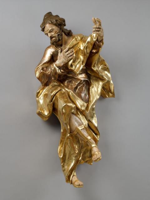 Christian Jorhan the Elder - A high relief wood figure of AN EVANGELIST