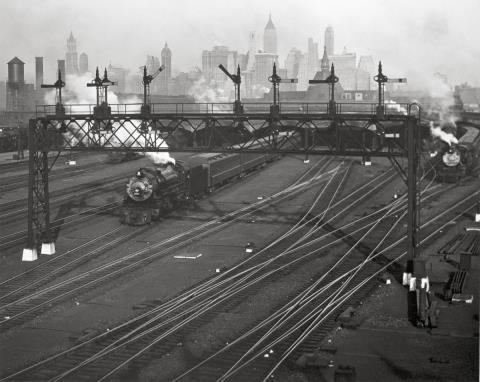 Berenice Abbott - HOBOKEN RAILROAD YARDS LOOKING TOWARDS MANHATTAN, NEW JERSEY